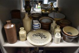 A group containing various stoneware and earthenware pottery, to include a country chicken pie dish,