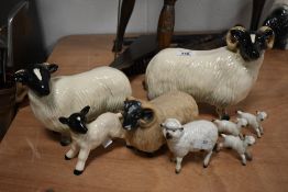 A large Pottery black-faced ram study, unmarked, h18cm, sold alongside a group of Beswick and
