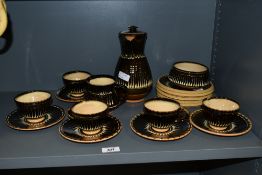 An attractive Coldstone pottery combed slip glaze coffee set, impressed marks to base, 18 pieces
