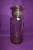A large clear glass confectionery jar and cover (some chipping) 43cm