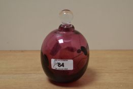 A John Ditchfield iridescent pink art glass scent bottle and stopper, of ovoid form and decorated