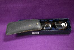 A pair of vintage mid-century faux tortoiseshell Connought spectacles