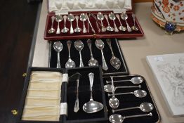 A group of cased silver plated flatware, to include spoons, a two piece baby spoon and food