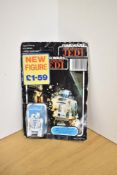 A Palitoy 1983 LFL Star Wars Return of the Jedi 2 1/4 Carded Figure, Artoo-Deetoo (R2-D2) with Pop-