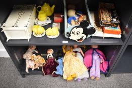 Two shelves of Children Toys and Dolls including tin plate and plastic tea set, Mickey Mouse Crib,