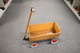 A Steiff 4838/20 Pull Along Articulated Wooden four wheel Truck, wood and metal handle, length 75cm