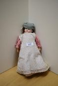 A early 20th century Armand Marseille bisque headed Doll having fixed open blue eyes, open mouth