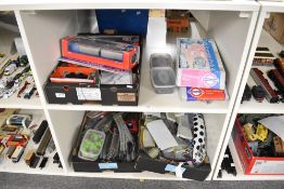 Two shelves of Bachmann Underground Ernie Trains, Rolling Stock, Track and Accessories including