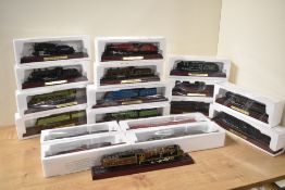 Eighteen Atlas 00 gauge model Loco & Tenders, all on plinths, 17 in original packaging, one loose,