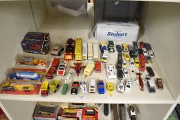 A shelf of playworn Die-casts including Matchbox, Lesney etc along with three Majorette Wagons in