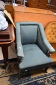 A Victorian maogany framed armchair with later teal upholstery