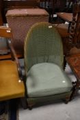 A vintage Lloyd Loom nursing chair