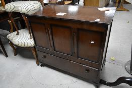 A vintage oak ply blanket box, having drawer to base, approx. dimensions W91 H85cm