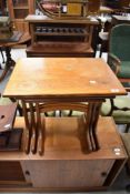 A vintage teak G plan or similar nest of three tables