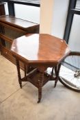 A Victorian mahogany octagonal occasional table having galleried under tier, width approx 61cm