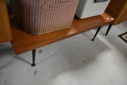 A vintage teak Meredew coffee table