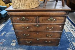 A period oak chest of two over three drawers (with additional 'secret' frieze drawer) (possibly been