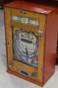 A 1950s amusement arcade wall machine, Wrigleys Spearmint Gum 'Win a Chew', height approx. 71cm (