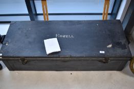 A vintage tin travel trunk, dimensions approx. 107 x 44 x 26cm