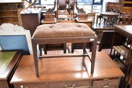 A 19th Century mahogany stool having later dralon covered drop in seat, on square legs and H