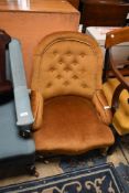 A Victorian button back nursing chair with later dralon upholstery
