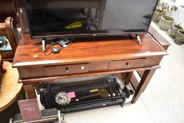 A modern hardwood side table, having two frieze drawers, width approx. 120cm