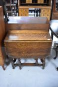 An early 20th Century oak gateleg table having wave edge, approx width 76cm