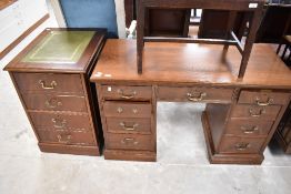 A reproduction Regency style mahogany filing cabinet and a Victorian style pedestal desk, width