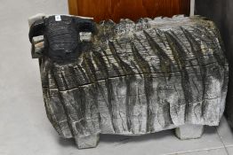 A wooden garden ornament modelled as Scotch Black Faced sheep, length approx 62cm