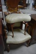 A French style armchair and kidney shaped footstool