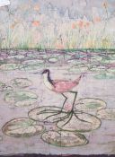 An unusual painting on material, an African Jacana standing on lily pads, within a moulded fame,