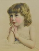 Apair of early 20th Century coloured prints of portraits of young children, framed, mounted, and