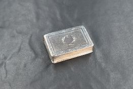 A late George III silver vinaigrette, of hinged rectangular book form, having decorative engraving