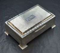 An Elizabeth II silver cigarette box, of hinged rectangular form, having engine turned decoration