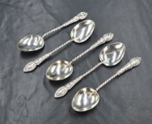A group of five late Edwardian silver teaspoons, having twisted handles with decorative embossed