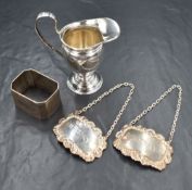 A Victorian silver cream jug, of traditional form having a generous spout opposed by a curved