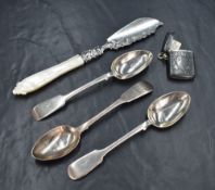 A Victorian silver butter curler knife, having decorative scroll work to the blade, embossed