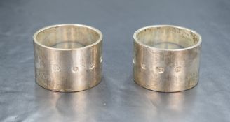A boxed pair of Elizabeth II silver napkin rings, of plain traditional form, marks for Sheffield