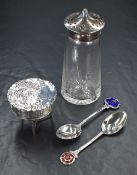 An Edwardian imported silver trinket box, of circular form with embossed scenes depicting a battle