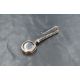 An Elizabeth II silver skirt lifter having a circular openwork design, marks for Sheffield 2006, - Image 1 of 2