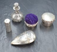 An Elizabeth II silver pin cushion, of circular form having embossed rose decoration to the rim with