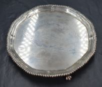A George V silver salver, having a gadrooned rim and personalised engraving to the centre with