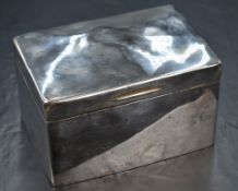 A George V silver cigarette box, of hinged rectangular form having sandalwood lined interior and