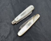 Two silver bladed mother-of-pearl fruit knives, of traditional form, both having silver inlays to