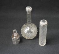 A late Victorian silver cased glass scent bottle, of pierced scroll design, marks for Birmingham