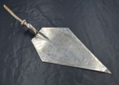 An Edwardian silver presentation trowel from the Holy Trinity School to 'Elixa wife of Abm. Wood