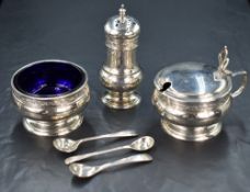 A George V silver three piece condiment set, comprising salt, mustard and pepper, of bulbous form