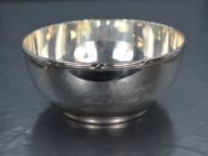 A George V silver bowl, having thread and cross decoration to the rim, and personalised engraving '