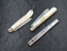 A Victorian silver bladed mother-of-pearl fruit knife, having floral engraving to the mother-of-