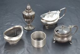 A pair of George V silver condiments, of oval form having half fluted bodies, marks for Birmingham